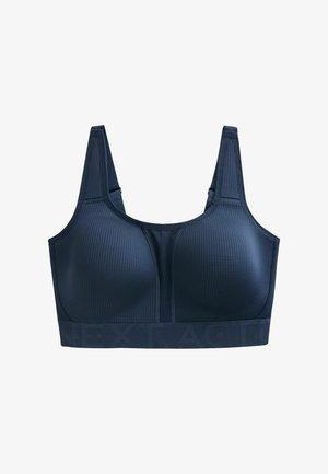 Sutien sport bleumarin realizat din material texturat, cu bretele late și o bandă elastică branduită la bază. Cupe structurate pentru susținere.