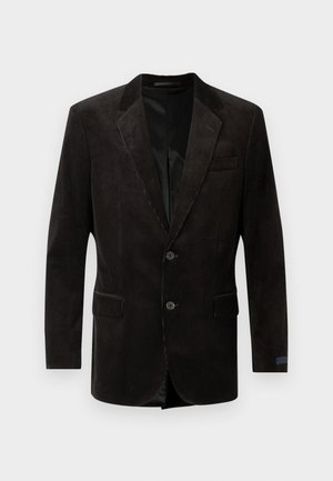 Blazer in velluto nero con revers a scialle, due tasche frontali, chiusura a due bottoni, tessuto testurizzato e rivestimento interno a contrasto.
