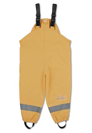 Pantalones de lluvia infantiles impermeables de color amarillo con tirantes ajustables negros, bandas reflectantes cerca de los tobillos y tiras elásticas para los pies.