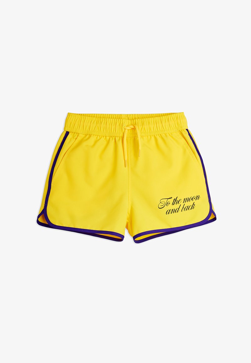 Shorts de sport jaunes avec bordure violette, taille élastique avec cordon de serrage, poches latérales, et texte "Jusqu'à la lune et retour" sur la jambe avant droite.