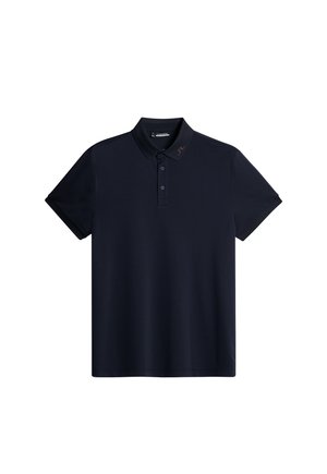 Marinblå polo som är tillverkad av ett mjukt material, med en knäppning med två knappar, korta ärmar och en diskret logotyp på kragen.