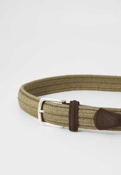 Woven olive green belt with a textured finish, featuring a silver metal buckle and dark brown leather accents.