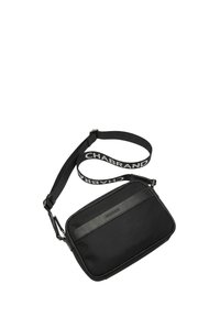 Sac bandoulière noir en nylon à texture lisse. Dispose d'une sangle amovible avec le logo "CHABRAND" et d'une fermeture éclair plate.