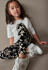 Next ANIMAL PRINT - Leggings - Byxor - black white daisy