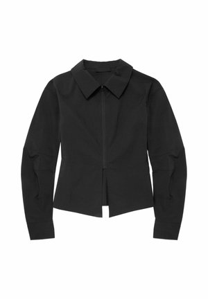 Veste noire à col montant avec une fermeture éclair à l'avant, des manches longues et une coupe droite, fabriquée en tissu lisse et léger. Aucun motif visible.