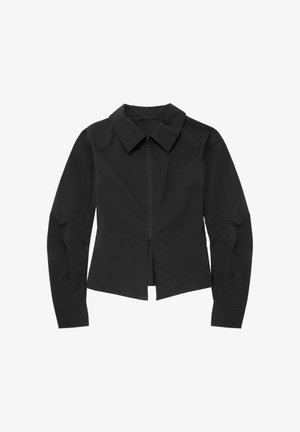 Veste noire à col montant avec une fermeture éclair à l'avant, des manches longues et une coupe droite, fabriquée en tissu lisse et léger. Aucun motif visible.