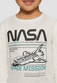 s.Oliver NASA mleczny