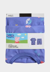 Korte pyjama set in puur katoen, met een levendige paarse kleur en speelse patronen zoals bloemen en cartoon elementen.