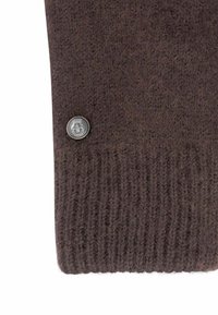 Brauner Strickstoff mit einer strukturierten Musterung und geripptem Bündchen, versehen mit einem runden Metallknopf mit Logodetail.