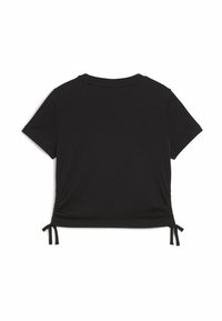 Camiseta negra de manga corta con lados fruncidos y lazos, cuello redondo y una textura suave. Diseño simple adecuado para superponer.