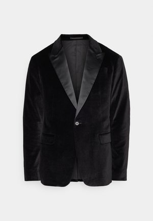 Black velvet blazer with satin lapels, single button closure, and two side pockets. Soft texture and tailored fit.