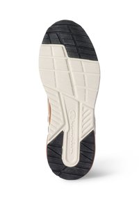 Gummisohle für Sneakers in Schwarz, Creme und Braun; mit strukturierten Griffmustern und einem weißen Logodetail im Zehenbereich.