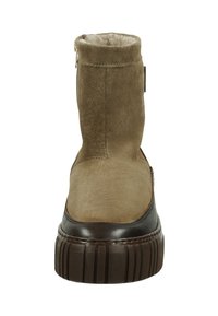 Brown suede ankle boot with a textured finish, featuring a side zipper, padded interior, and a thick, ridged rubber sole.