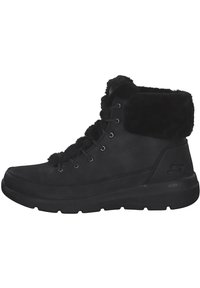 Botas de tobillo negras de cuero con ribete de piel sintética, que cuentan con un diseño de cordones, punta redonda y una suela acolchada para mayor comodidad.