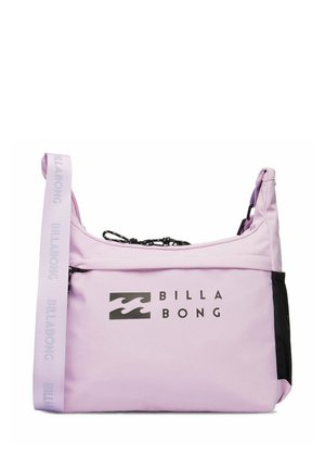 Sac à épaule Billabong violet clair avec logo noir, poche avant zippée, bandoulière réglable et poche latérale en mesh noir.