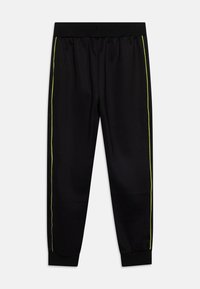 Svarta sportbyxor med en mjuk textur, som har en slim fit, elastisk midja och neongröna sidostängar. Muddade anklar fulländar designen.