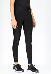 Swedemount PERFORMANCE TIGHTS W - Leggings - glossy black
