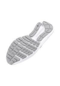 Schuhsohle aus weißem und grauem Gummi mit strukturierten Mustern, ausgestattet mit runden Noppen und wellenförmigen Linien für besseren Halt. Insgesamt leichtes Design.