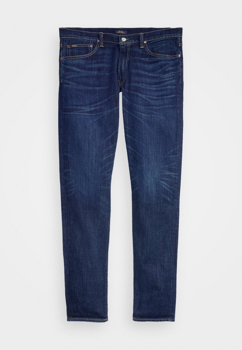 Mørkeblå slim-fit denimjeans med lommer foran og bagpå, knaplukning og subtile falmede vaskedetaljer på lår og knæ.