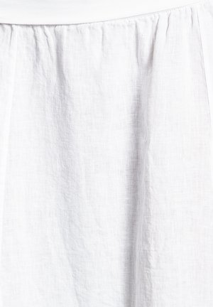 Weißer Leinenrock mit einer strukturierten, leicht zerknitterten Oberfläche. Verfügt über einen elastischen Bund und ein fließendes Design, das bis zur Mitte der Waden reicht.