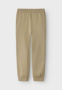 Beige Sweatpants mit weicher Textur, elastischem Bund und Bündchen. Schmal zulaufendes Bein-Design, geeignet für Freizeitkleidung und Komfort.