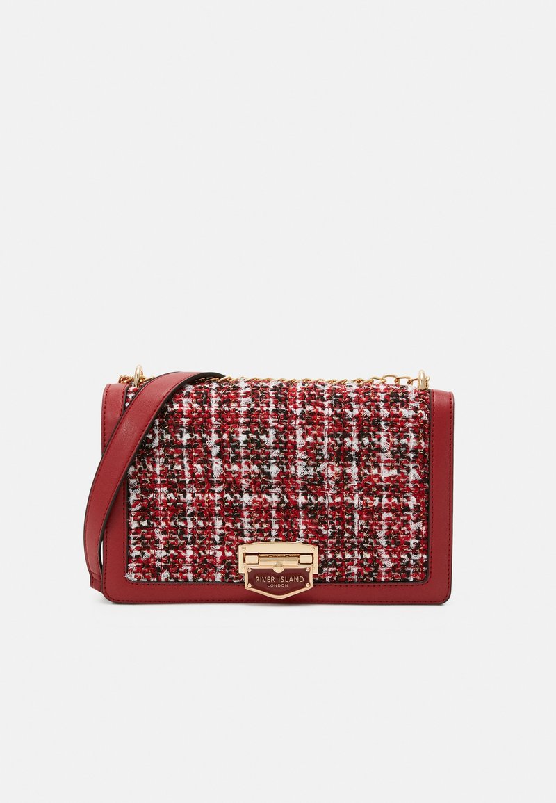 Red and multicolored tweed handbag with a gold clasp and chain accents. Features a structured shape and a classic design.