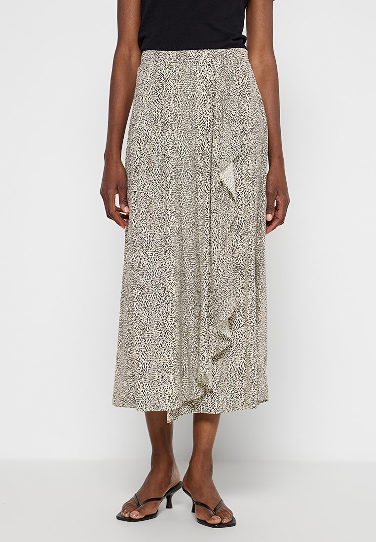 Beżowa spódnica midi w czarne abstrakcyjne wzory, z falbaną z przodu i elastycznym pasem. Lekka tkanina o płynnej draperii.