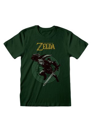 Donkergroene katoenen t-shirt met een zwarte afbeelding van een personage met een zwaard, met daarboven in het goud de tekst "The Legend of Zelda".