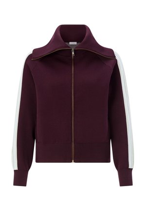 Jachetă burgundy cu fermoar și guler înalt, dungi albe pe mâneci și manșete și tiv striate. Dispune de un fermoar auriu și o textură netedă.