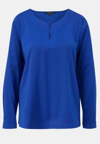 Blouse bleu cobalt à manches longues avec un col en V fendu et une coupe décontractée, fabriquée en tissu lisse.