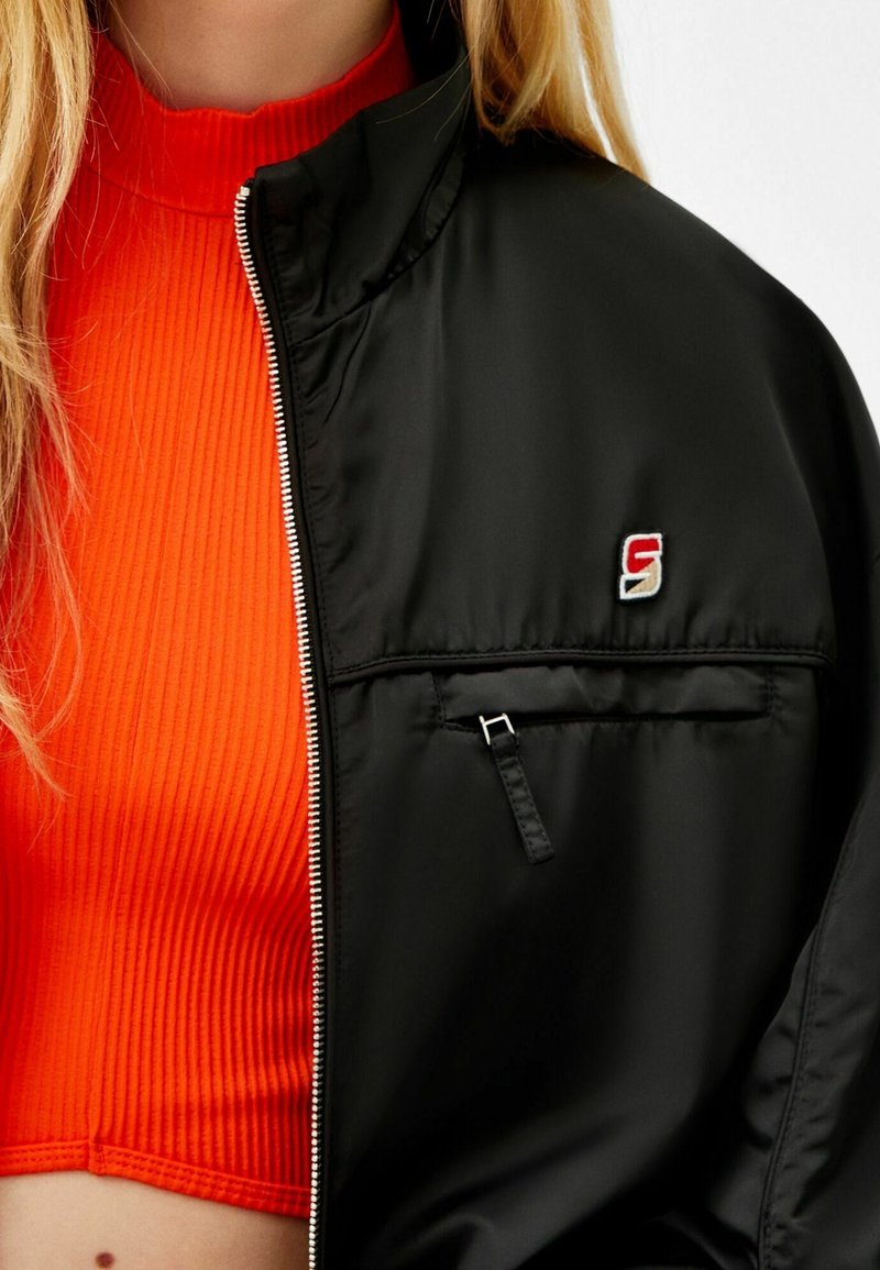 Bershka Chaqueta de entretiempo black/negro (Segunda mano