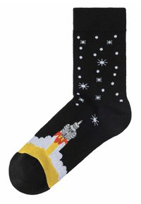 Schwarze Baumwollsocke mit einem Raketenstart-Design, umgeben von gelben und roten Flammen und weißen Sternen auf einem strukturierten Hintergrund.