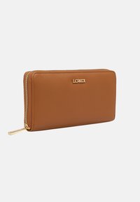 Brown leather wallet with zipper closure, featuring a gold logo accent and a smooth texture. Rectangular shape with clean lines.