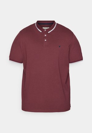 Burgundy polo shirt made of cotton, featuring a classic collar, three-button placket, white accents on the collar and sleeves, and a logo on the chest.