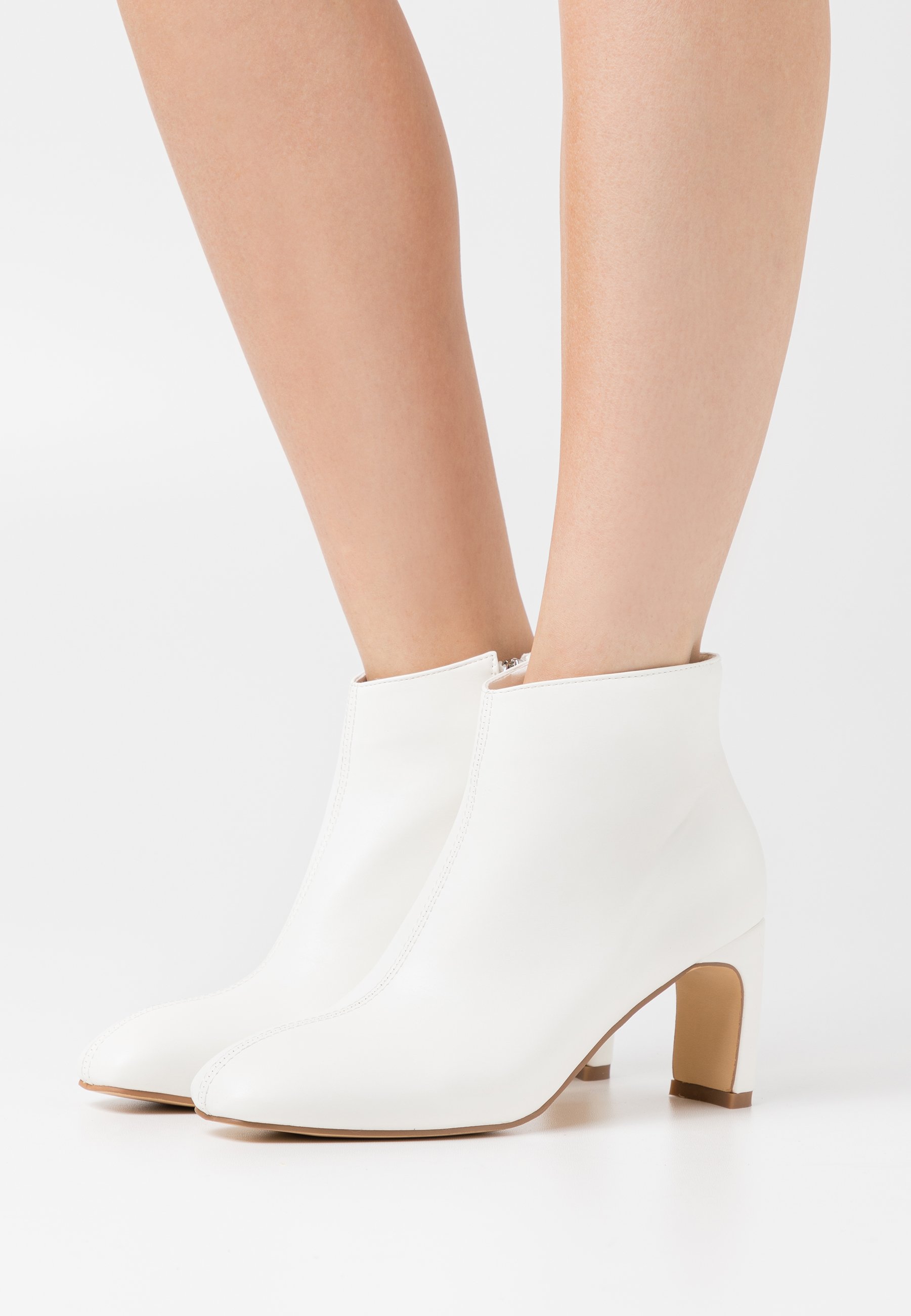 white low ankle boots