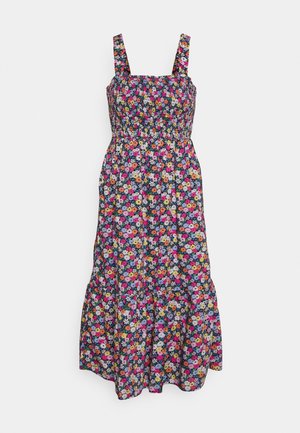 Ærmeløs midi-kjole med smocket bodice og farverigt blomsterprint med pink, orange, hvide og lilla blomster på mørk baggrund.