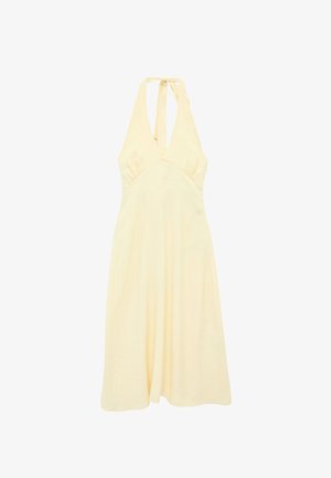 Robe sans manches jaune pâle à col halter avec un décolleté en V profond et une jupe fluide en ligne A, nouée à l'arrière du cou.