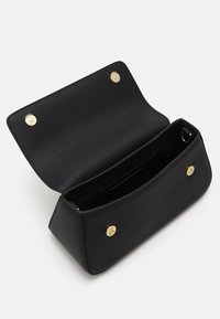 Black leather handbag with a structured shape, featuring a magnetic snap closure and gold hardware accents. Open top reveals interior compartments.
