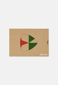 Brown cardboard packaging with a triangular cutout revealing red and green shapes inside. "Zalando" logo printed in white at the bottom right.