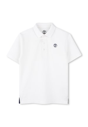Polo shirt blanc à manches courtes, avec une patte de boutonnage à trois boutons et un logo marine sur la poitrine. Présente des fentes latérales avec des accents marins.