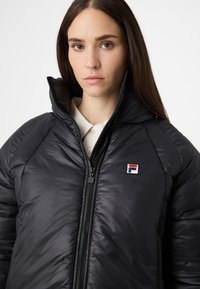 Fila MONTEROSA LOOSE - Vinterjacka - black