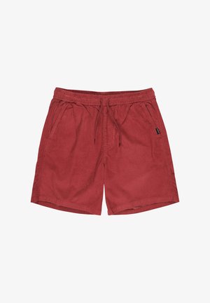 Czerwone sztruksowe szorty z elastycznym pasem, sznurkiem do regulacji i kieszeniami bocznymi na białym tle.