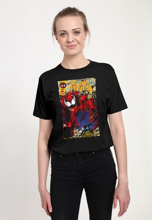 Black cotton t-shirt featuring a colorful comic book design with a red character, bold text, and vibrant background elements.