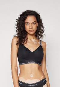 Calvin Klein Underwear LIGHTLY LINED ICON - Sujetador sin tirantes/multiescote - black