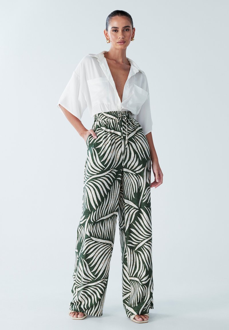 BWLDR ALAIA - Trousers - khaki floral