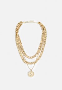 Sélectionné, gold-coloured