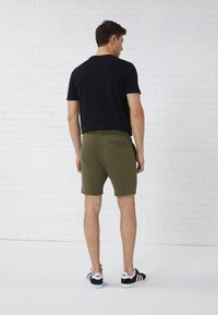 Pier One Pantalon de survêtement - olive