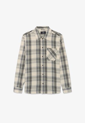 Ilga piedurkņu bēša pogām aiztaisā krekla ar melnu un pelēku rūtainu rakstu un vienu krūšu kabatu ar diagonāliem rūtainiem svītrām.