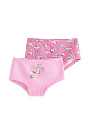 To lyserøde børnetrusser, den ene ensfarvet med Hello Kitty og Cinnamoroll med balloner, den anden mønstret med gentagne Cinnamoroll-ansigter og stjerner.