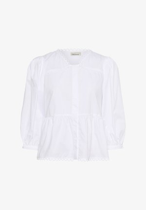 Fehér pamut blúz puffos ujjal, scallop díszítéssel a nyakvonalon és az alján, gombos záródás elöl, valamint fodros peplum kialakítással.